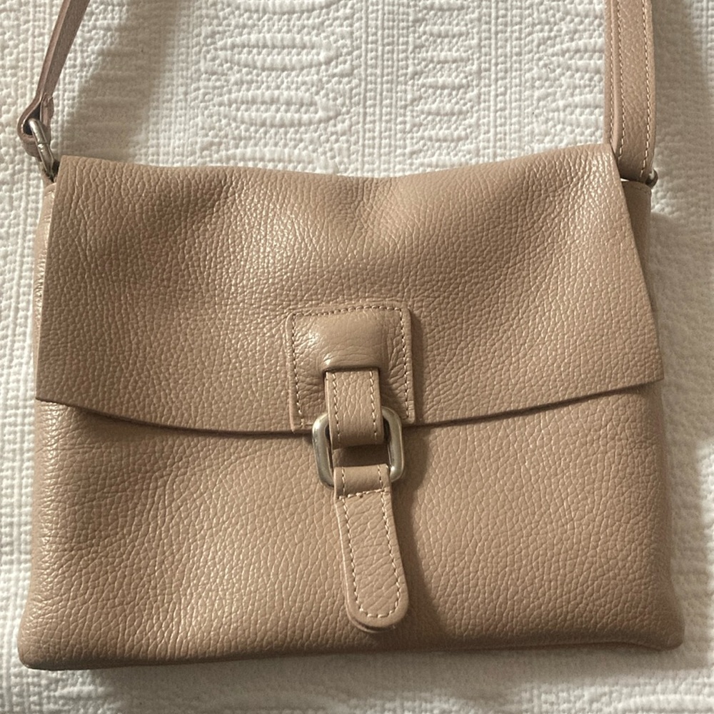 All leather beige purse.